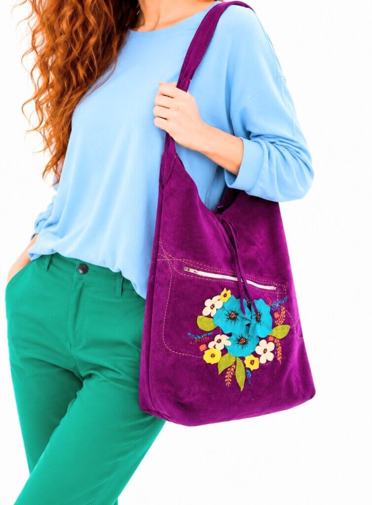 Geanta de umăr din piele naturală întoarsă,cu flori de camp aplicate